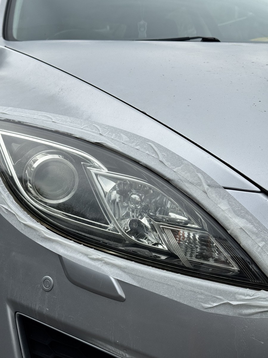 Sedan headlight after restoration, clear and glossy