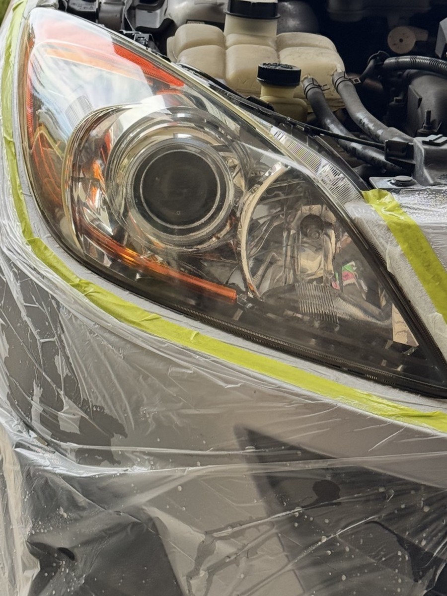 Wagon headlight after restoration, clear and glossy